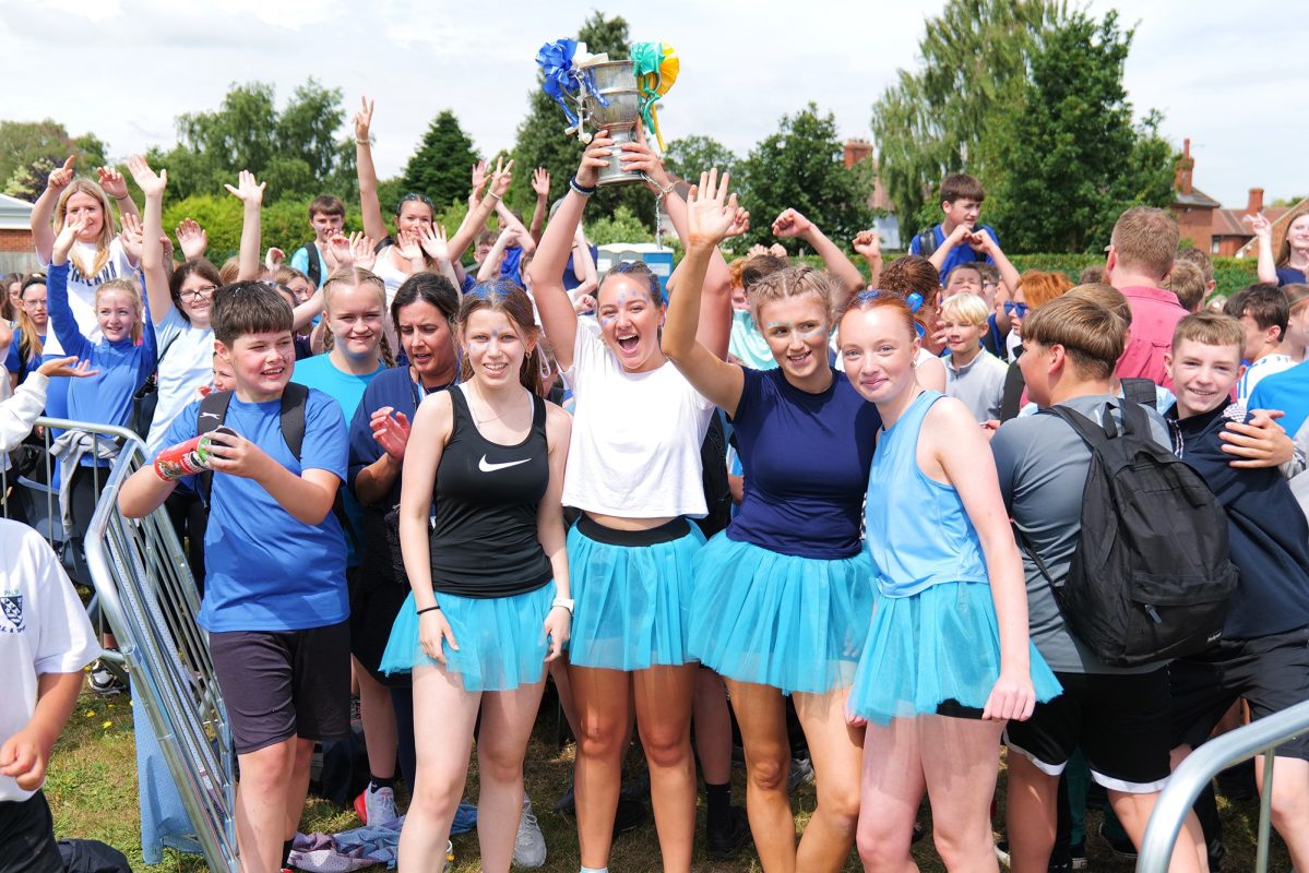 Vale of York athletes and pupils celebrating at Selby High School sports day