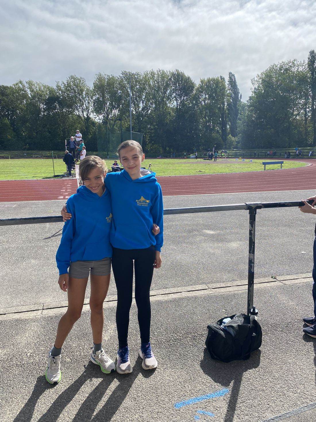 Everly and Lily in their new Humber hoodies at the inter-counties match